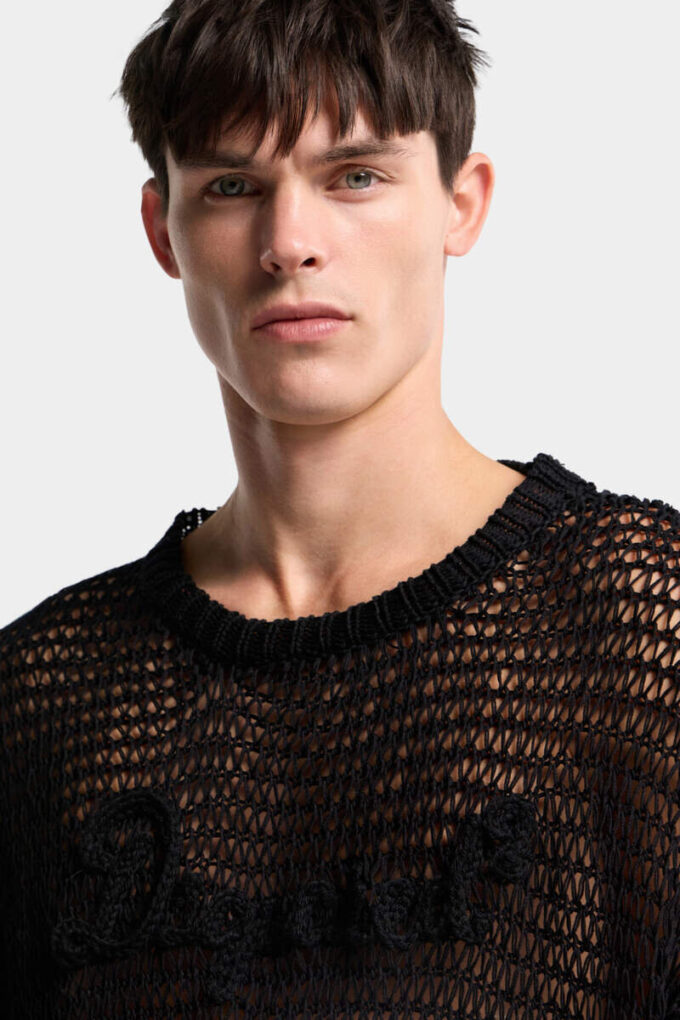 Charakterystyczny sweter z ażurowym wzorem marki Dsquared2