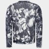 Sweter z motywem tańczących kwiatów