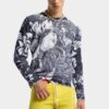 Sweter z motywem tańczących kwiatów